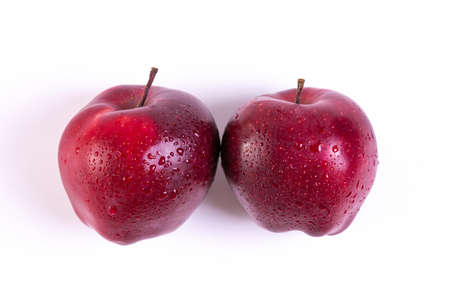 Fresh red apple on white backgroundの写真素材