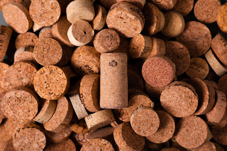 Recycling symbol and wine cork for secondary use. Preservation of the ecology of the planet. Raw...