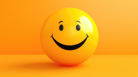 World Day of Smiles. Orange ball with painted smiles on a yellow background.の素材