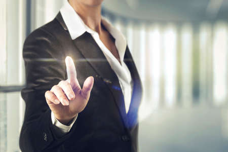 Business women touching the abstract screenの写真素材