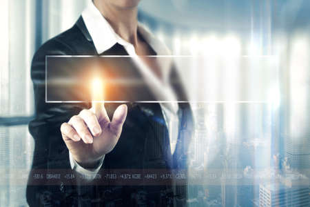 Business women touching the screenの写真素材