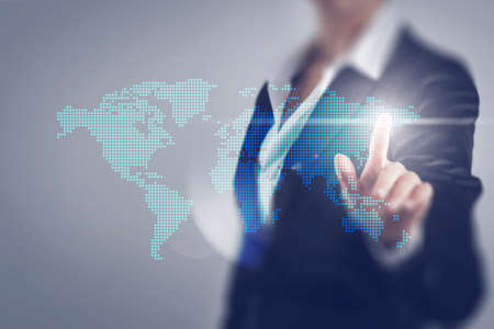 Businessman women toching the world screen