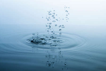 Ripples on the water surface and bublesの写真素材
