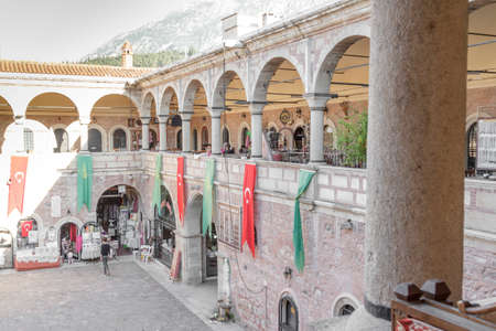 Izmir, Turkey - April 21, 2016 :Yeni Han in Manisa is an old building. There are many cafes and shops selling souvenirs. People often come here to rest and get presents.のeditorial素材
