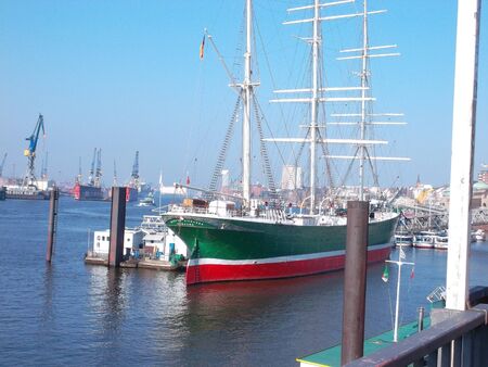 A small boat in a large body of waterundefinedの写真素材