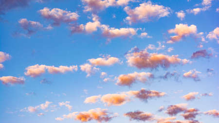 Blue sky with dramatic cloudscape in the twilight with sunset or sunrise. Selective focus.の写真素材
