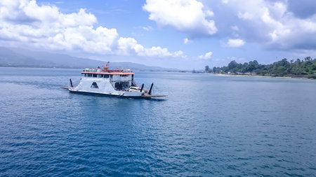 Ambon, Maluku, Indonesa - August 17, 2015: Residents rely on sea transportation to get acrossのeditorial素材