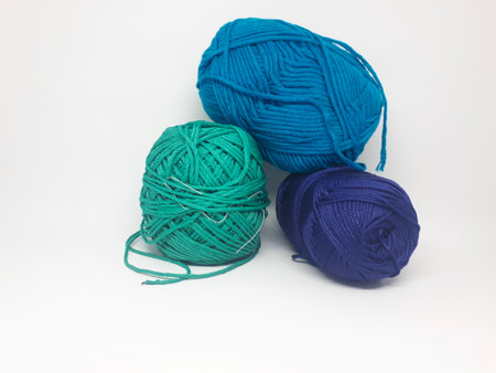 three woolen threads of different beautiful colors