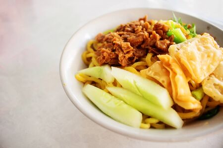 Close up of Chicken Noodle Indonesian Food on White Backgroundの写真素材