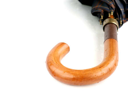 umbrella handle in water drops on a white backgroundの写真素材