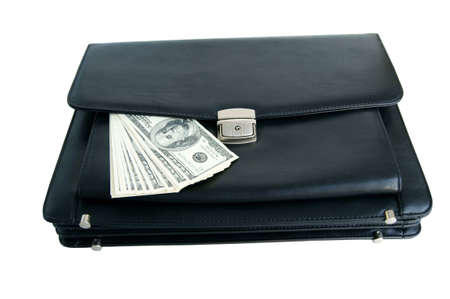 Black briefcase and money isolated on white backgroundの写真素材