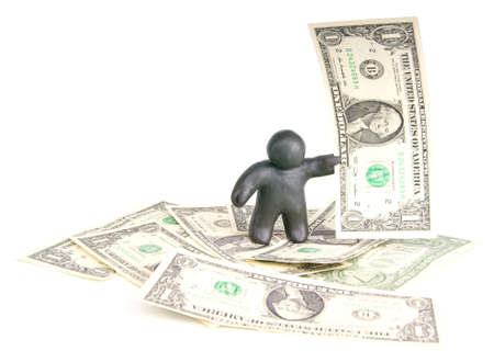 plasticine man with banknote one dollar on dollar backgroundの写真素材