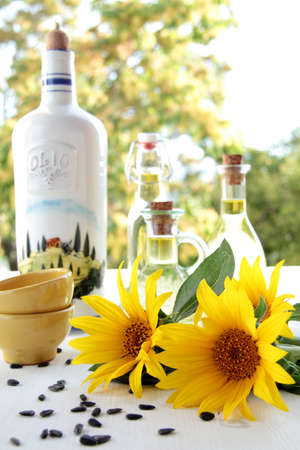 sunflower oil 0n wood table with natural backgroundの写真素材