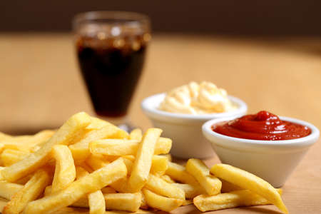 French Fries on wooden table