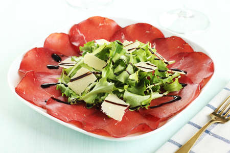 bresaola with green  salad and parmesanの写真素材
