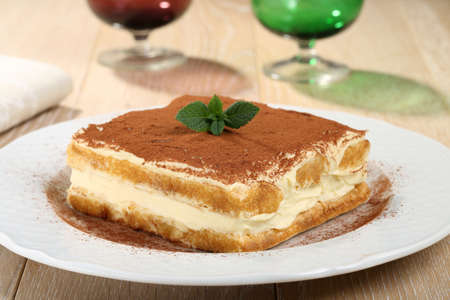 tiramisu dessert on ceramic plateの写真素材