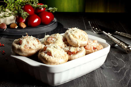 mushroom stuffed green backgroundの写真素材