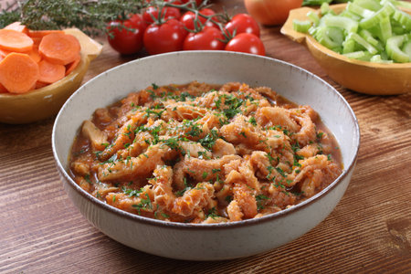 Bowl with tasty carrot ragout on wooden table, closeupの写真素材