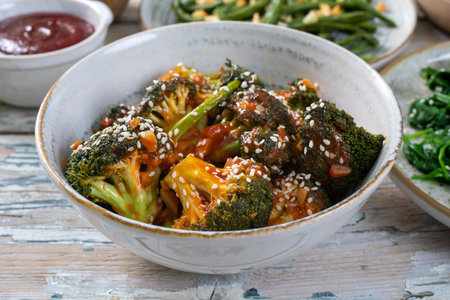Stir-fried broccoli with sesame seeds and korean sauceの写真素材