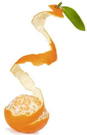  Half peeled  mandarin with leaf. Isolated on a white background. の写真素材