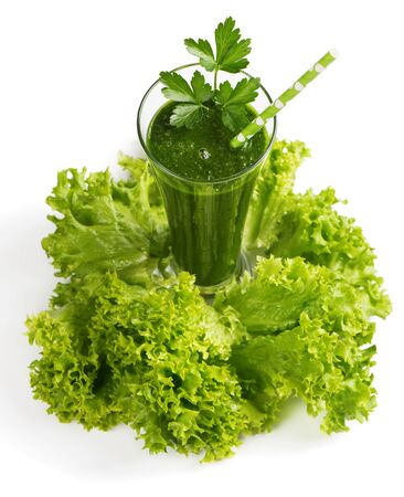 Green smoothie with leafy kale and parsley isolated on white backgroundの写真素材
