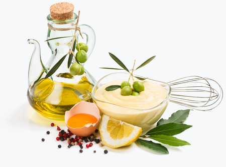 Sauce mayonnaise homemade from olive oil and other ingredients isolated on a white background.の写真素材