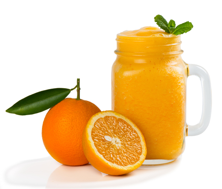 Orange fruit and smoothie in a jar mug isolates on white background.の写真素材