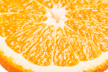  Cut an orange fruit in half, selective focus, shallow dof. Close up.の写真素材