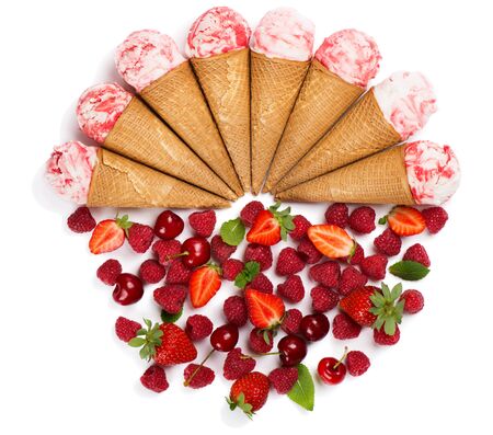 Top view of ice cream cones and assorted berry fruitsの写真素材