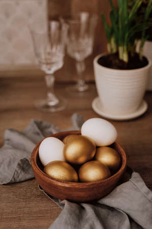 Mood easter serving in kitchen with eggs