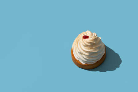 Cupcake with cream with shadow on mothers day or valentinesの写真素材