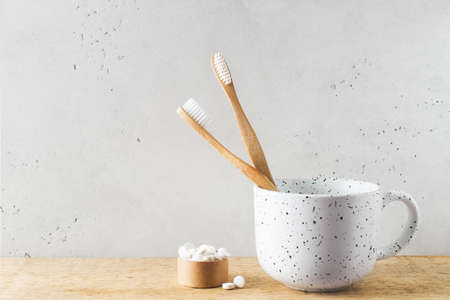 Zero waste, sustainability and minimalism concept. Wooden ecological bathroom accessories on white background, copy space, top viewの写真素材