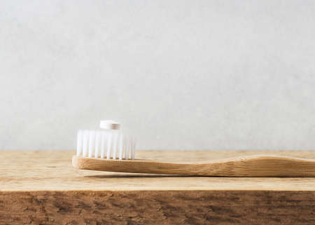 Zero waste, sustainability and minimalism concept. Wooden ecological bathroom accessories on white background, copy space, top viewの写真素材