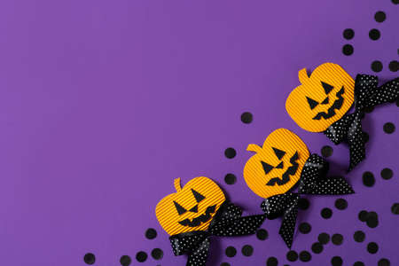 Kids halloween handmade paper pumpkins, creative, craft conceptの写真素材