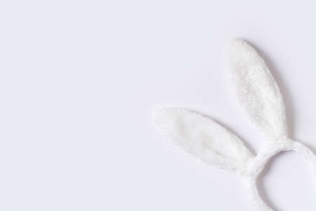 Happy easter concept with white bunny ears on grey backgroundの写真素材