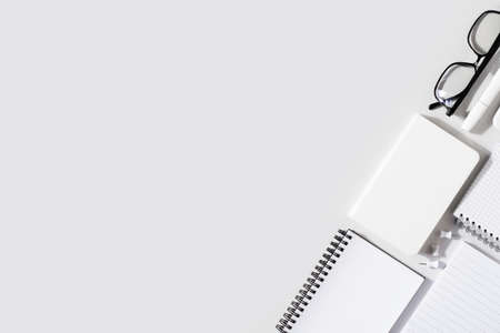 Education flat lay concept with knolling workplace with supplies on white background, top view, copy spaceの写真素材