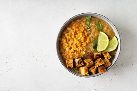 Lentil soup with ingredient on white backgroundの写真素材