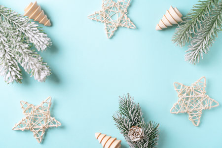 New year and happy christmas card with white wooden decor on blue backgroundの写真素材