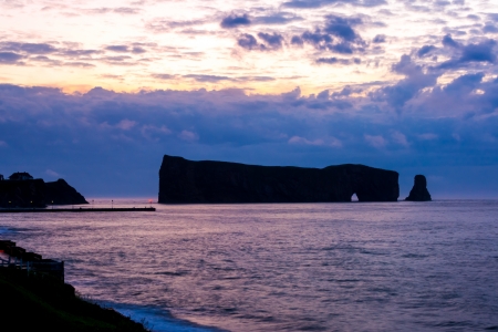 Silhouette of Perce Rock in Gaspe at dusk.の写真素材