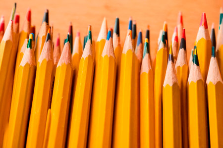 Yellow Pencils with Colorful Tips Arranged in Rows. Generative AI.の写真素材