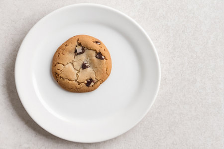 Delicious Chocolate Chip Cookie on White Plate. Generative AI.