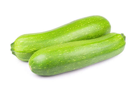 Ripe isolated zucchini on a white background. Fresh vegetables.の写真素材