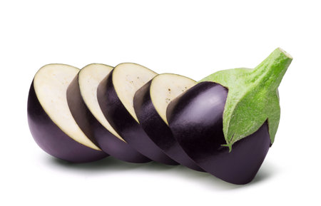 Ripe sliced eggplant isolated on white. Fresh vegetables.の写真素材