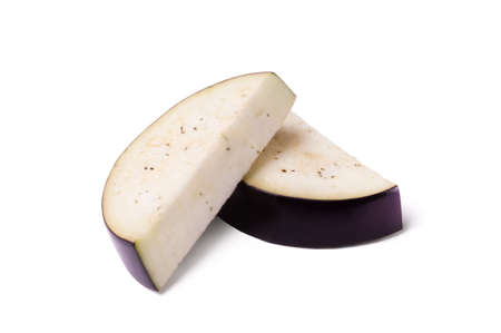 Eggplant slices isolated on white background. Fresh vegetables.の写真素材