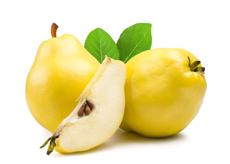 Ripe quince and quince slice isolated on white background.の写真素材