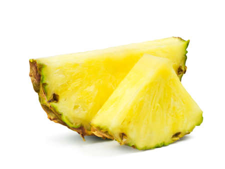 Ripe juicy pineapple slices isolated on a white background. Fresh fruits.の写真素材