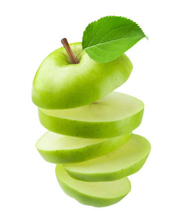Apple isolated. Flying sliced ripe fresh green apple isolated on white background.の写真素材
