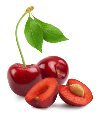 Cherry isolated. Ripe sweet cherries and cherry slices with leaf isolated on white background. fresh fruit berries.の写真素材