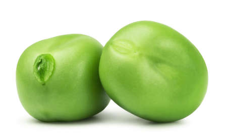 Peas isolated. Two green peas on a white background.の写真素材