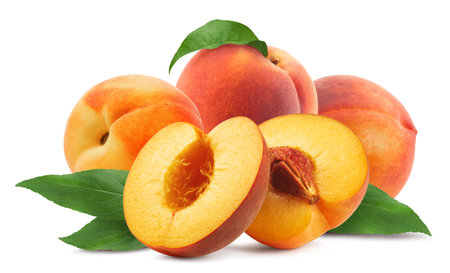Peaches isolated. Ripe sweet peaches with leaves on a white background. fresh fruit.の写真素材